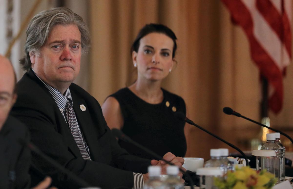 White House Chief Strategist Steve Bannon (L) listens with U.S. Deputy National Security Advisor for Strategy Dina Powell (R) during a bilateral meeting between U.S. President Donald Trump (L) and China's President Xi Jinping (Not Pictured) at Trump's Mar-a-Lago estate in Palm Beach, Florida on April 7, 2017. (REUTERS/Carlos Barria)