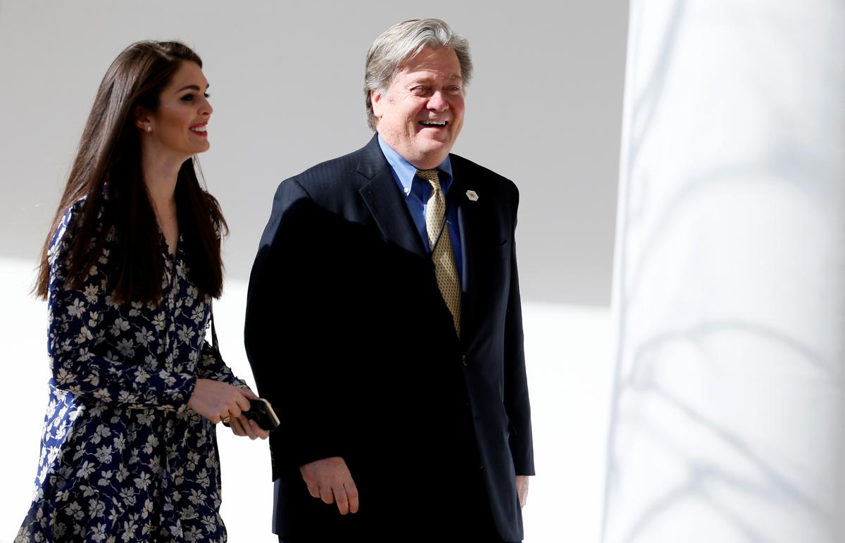White House chief strategist Steve Bannon and White House director of strategic communications Hope Hicks walk along the colonnade ahead of a joint press conference by Japanese Prime Minister Shinzo Abe and President Donald Trump at the White House in Washington on Feb. 10, 2017. (REUTERS/Jim Bourg)