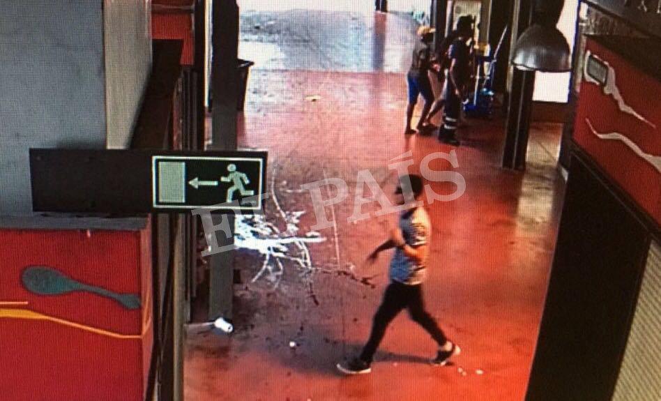 A watermarked CCTV frame grab provided by Spanish newspaper El Pais shows a suspect walking through La Boqueria market seconds after a van crashed into pedestrians in Barcelona, Spain, Aug. 17, 2017. (Courtesy of El Pais via REUTERS)