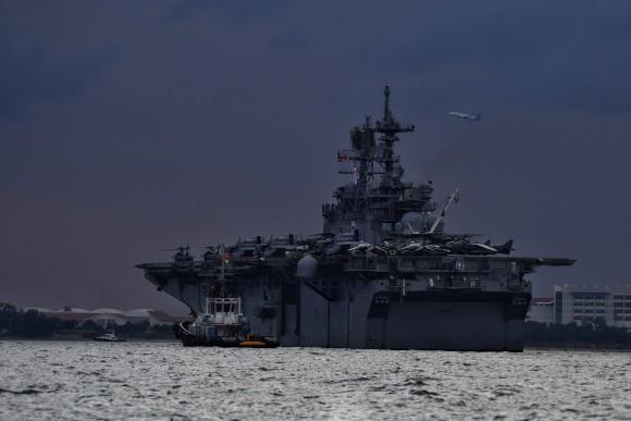 U.S Navy's USS America, which is supporting ongoing search for missing crew members of USS John McCain, is seen in Singapore waters, August 21, 2017. (Ariffin Jamar/The Straits Times via Reuters)