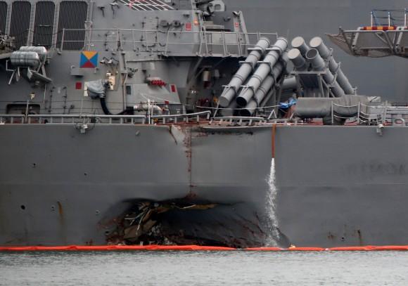 The damaged USS John McCain is docked at Changi Naval Base in Singapore August 22, 2017. (Reuters/Calvin Wong)