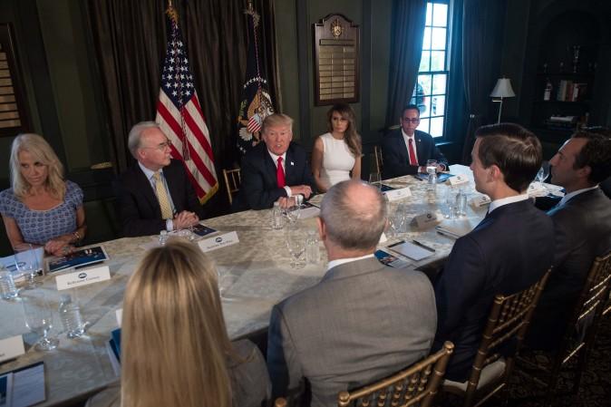 President Donald Trump speaks with administration officials on the opioid addiction crisis at the Trump National Golf Club in Bedminster, N.J., on August 8. (NICHOLAS KAMM/AFP/Getty Images)