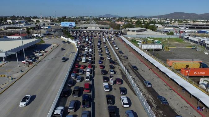 Aerial view of motorists waiting to cross the border bridge between Mexico and the United States at the Otay checkpoint on Jan. 25, 2017, in Tijuana, Mexico. (Mario Vazquez/AFP/Getty Images)