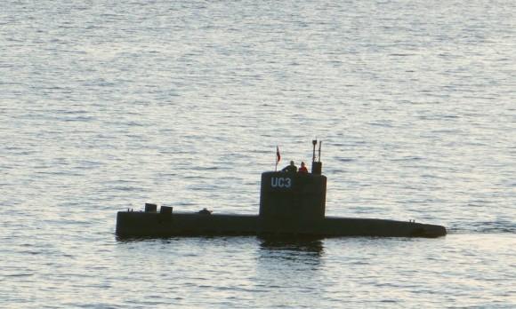 Allegedly Swedish journalist Kim Wall stands next to a man in the tower of the private submarine UC3 Nautilus on Aug. 10, 2017 in Copenhagen Harbor. (Peter Thompson/AFP/Getty Images)