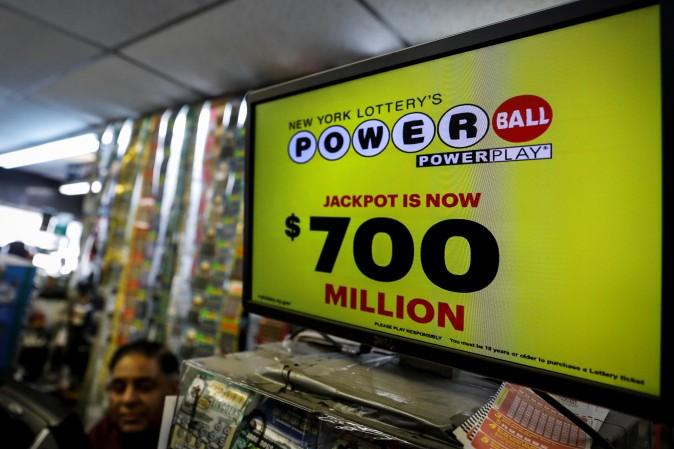 A screen displays the value of the Powerball jackpot at a store in New York City, on Aug. 22, 2017. (Brendan McDermid/Reuters)