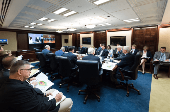 President Donald Trump is seen on screen in the White House Situation Room, as he conducts a video teleconference regarding an update on Hurricane Harvey, from a conference room at Camp David, on Aug. 26, 2017. (Official White House Photo by Andrea Hanks)​