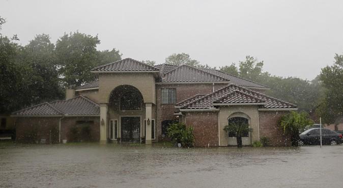 A house is flooded in east Pearland, on August 27, 2017 as the US fourth city battles with tropical storm Harvey and resulting floods. (THOMAS B. SHEA/AFP/Getty Images)