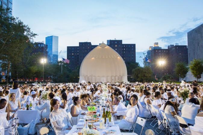 Guests attend the annual Diner en Blanc at Lincoln Center in New York on Aug. 22, 2017. Diner en Blanc began in France nearly 30 years ago. (Eric Vitale for Diner en Blanc)