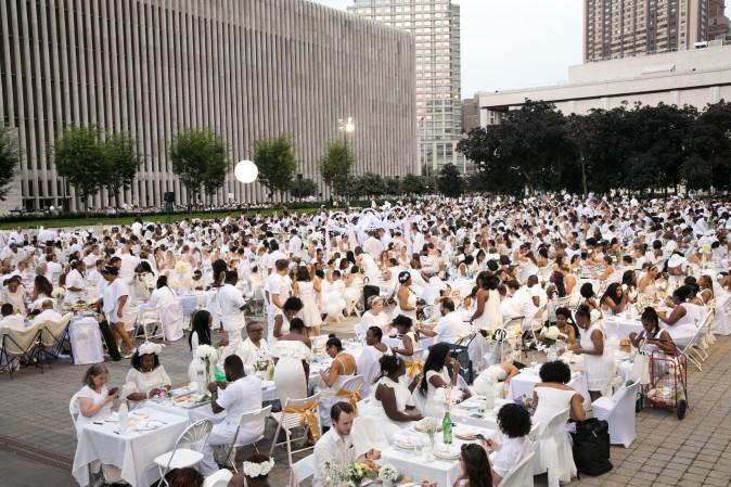 Guests attend the annual Diner en Blanc at Lincoln Center in New York on Aug. 22, 2017. Diner en Blanc began in France nearly 30 years ago and is held around the world. (Hal Horowitz for Diner en Blanc)
