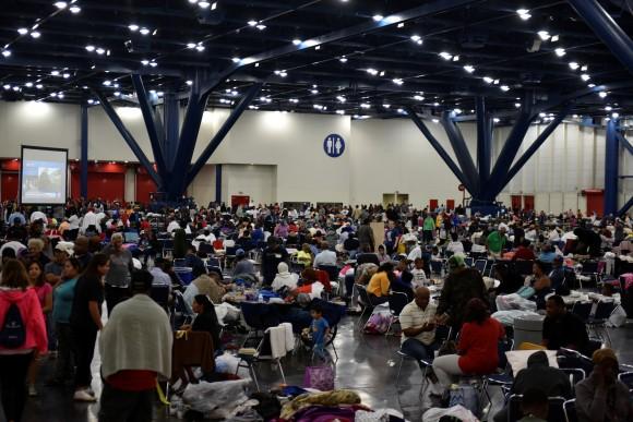 Evacuees fill an exhibition hall at the George R. Brown Convention Center where people have taken refuge in Houston, Texas, U.S. August 29, 2017. (Reuters/Nick Oxford)
