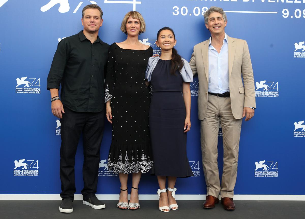 Director Alexander Payne poses with actors Matt Damon, Kristen Wiig and Hong Chau during a photocall for the movie "Downsizing" at the 74th Venice Film Festival in Venice, Italy on Aug. 30, 2017. (REUTERS/Alessandro Bianchi)