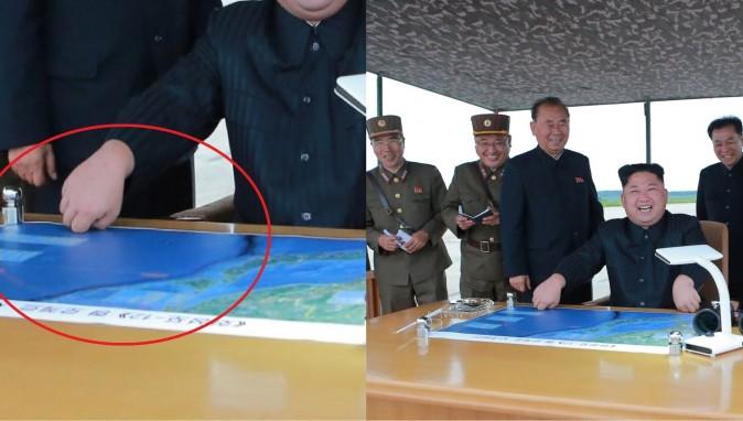 In this photo released by Korean Central News Agency (KCNA) on Aug. 29, North Korean dictator Kim Jong-un can be seen sitting next to a table with a map on top that apparently visualizes the intended launch plan for the Hwasong-12 missile. (KCNA)