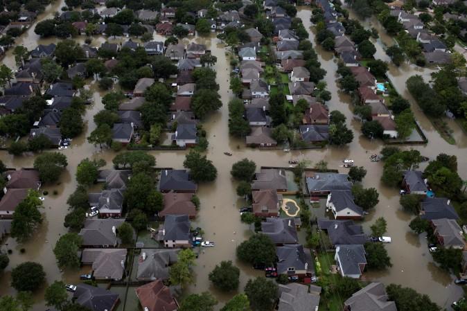Houses are seen submerged in flood waters caused by Tropical Storm Harvey in Northwest Houston, Texas, U.S. August 30, 2017. (REUTERS/Adrees Latif)