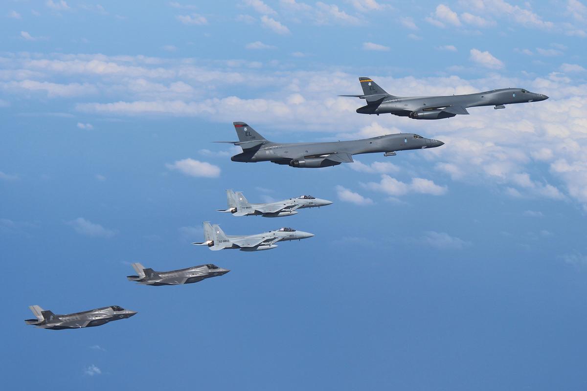 Two U.S. Air Force B-1B Lancer bombers fly from Andersen Air Force Base, Guam, for a mission, with an escort of a pair of Japan Self-Defense Forces F-15 fighter jets and U.S. Marines' F-35B fighter jets in the vicinity of Kyushu, Japan, in this photo released by Air Staff Office of the Defense Ministry of Japan August 31, 2017. (Air Staff Office of the Defense Ministry of Japan/HANDOUT)