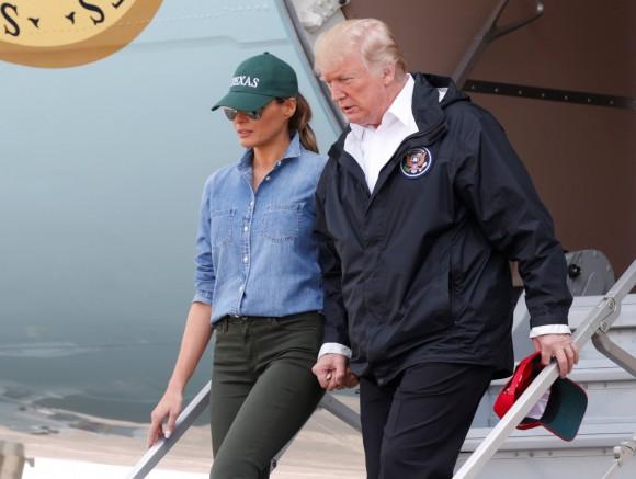 President Donald Trump and first lady Melania Trump deplane after arriving at Ellington Field to meet with flood survivors and volunteers who assisted in relief efforts in the aftermath of Hurricane Harvey, in Houston, Texas, Sept. 2, 2017. (REUTERS/Kevin Lamarque)