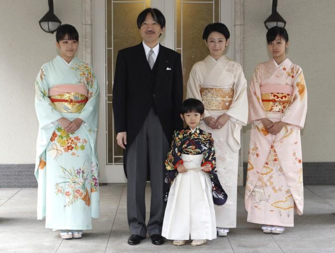 Japan's Prince Hisahito (C) wearing traditional ceremonial attire is accompanied by his father Prince Akishino (2nd L), mother Princess Kiko (centre R) and sisters Princess Mako (L) Princess Kako (R) after the Chakko-no-Gi and Fukasogi-no-gi ceremonies at the Akasaka imperial estate in Tokyo on November 3, 2011. Prince Hisahito, who turned 5-years-old last September had his rite of passage as a member of the Japanese royal family. (Issei Kato/AFP/Getty Images)
