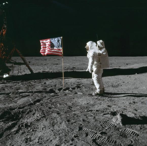 In this July 20, 1969, file photo, astronaut Edwin E. "Buzz" Aldrin Jr. stands next to a U.S. flag planted on the Moon during the Apollo 11 mission. Aldrin and Neil Armstrong were the first men to walk on the lunar surface. Jim Bridenstine, Trump's newly nominated administrator of NASA, vows to compete with China in space by launching a new manned mission to the Moon. (Neil A. Armstrong/NASA)