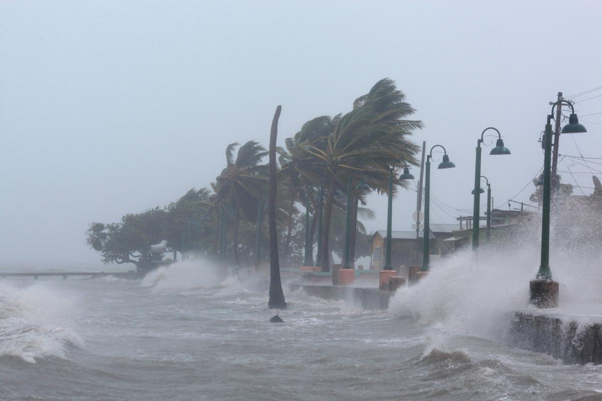 Waves crash against the seawall in Fajardo, Puerto Rico. (REUTERS/Alvin Baez)