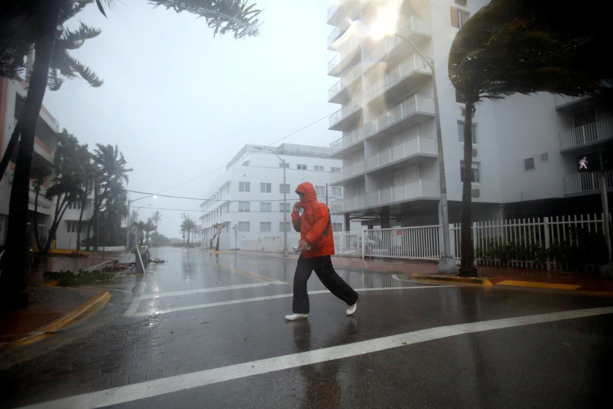 Man walks along a street in South Beach as Hurricane Irma arrives at south Florida, in Miami Beach, Florida on Sept. 10, 2017. (REUTERS/Carlos Barria)