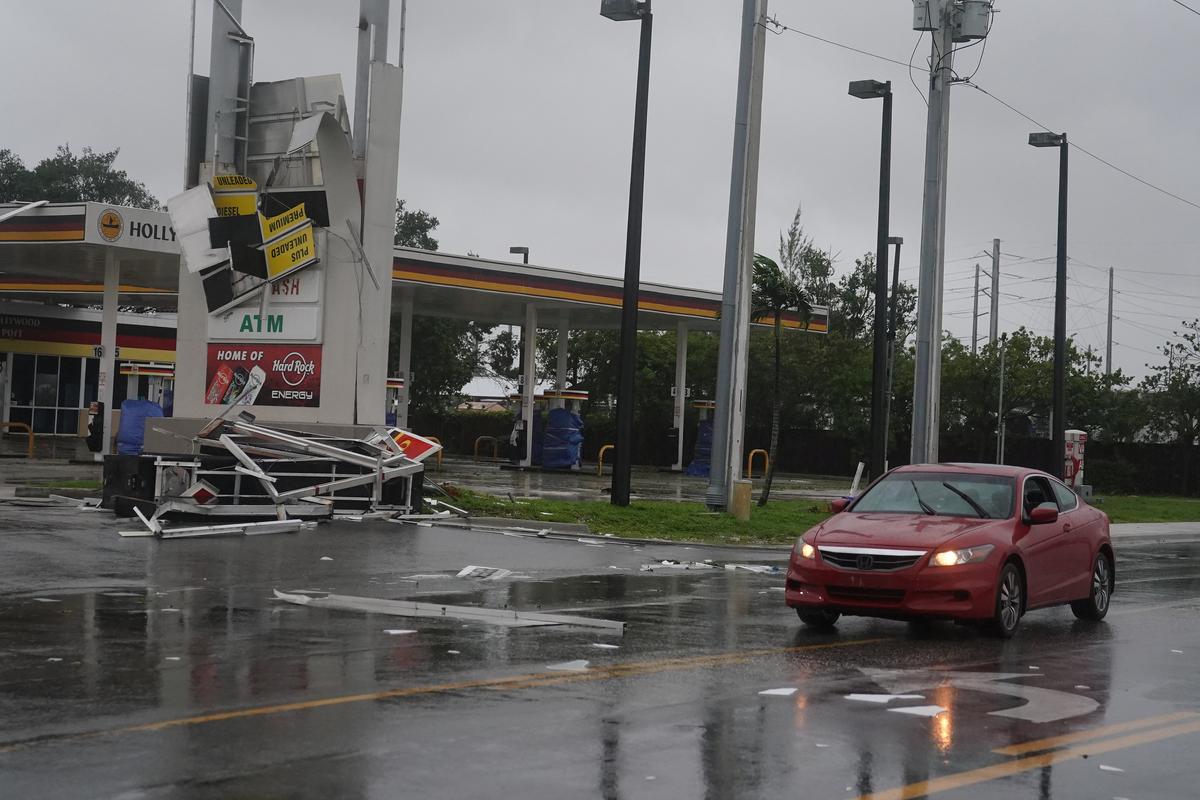A gas station sign lays destroyed after Hurricane Irma blew though Fort Lauderdale, Florida on Sept. 10, 2017. (REUTERS/Carlo Allegri)