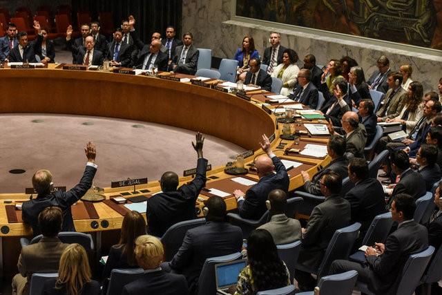 Ambassadors to the UN vote during a United Nations Security Council meeting on North Korea in New York City on Sept. 11, 2017. (REUTERS/Stephanie Keith)