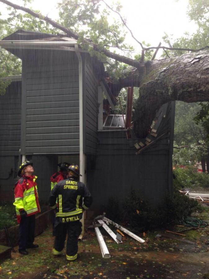 A tree smashed into a house killing the man inside in Sandy Springs, Ga., on Sept. 11, 2017, as Tropical Storm Irma moved across the state. (City of Sandy Springs)