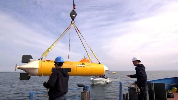 The SonarFish ROV is lowered into the waters of Lake Ontario. (Raise the Arrow)