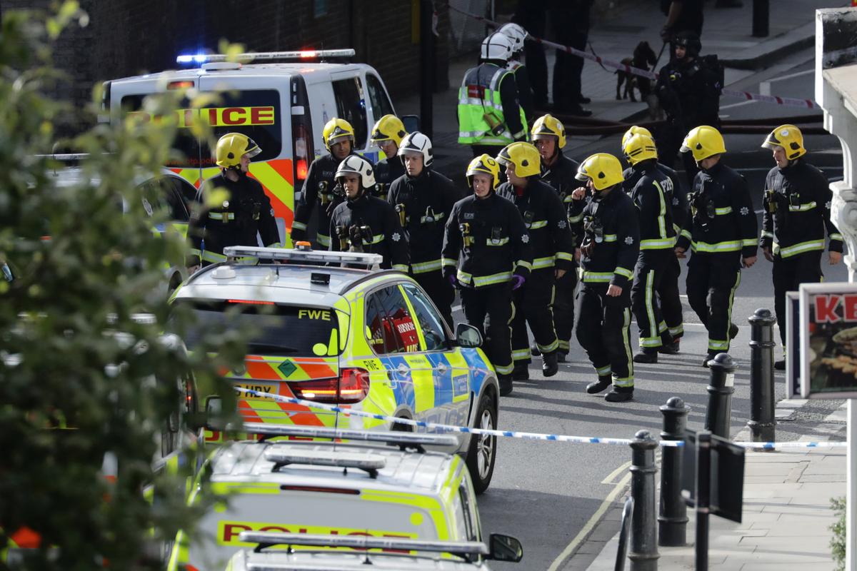 Members of the emergency services work near Parsons Green tube station in London, Britain on Sept.15, 2017.(REUTERS/Kevin Coombs)