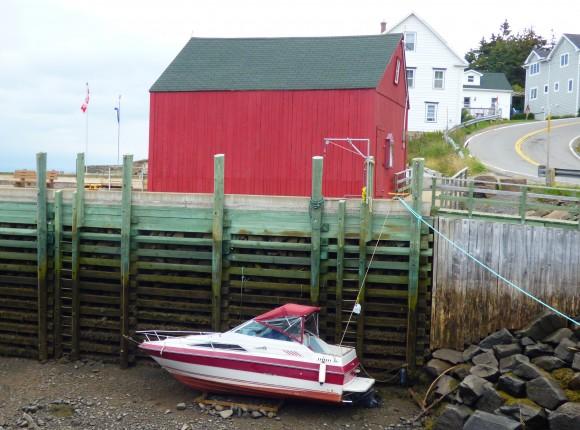 A boat rests on the harbour bottom at low tide in Hall's Harbour. (Manos Angelakis)
