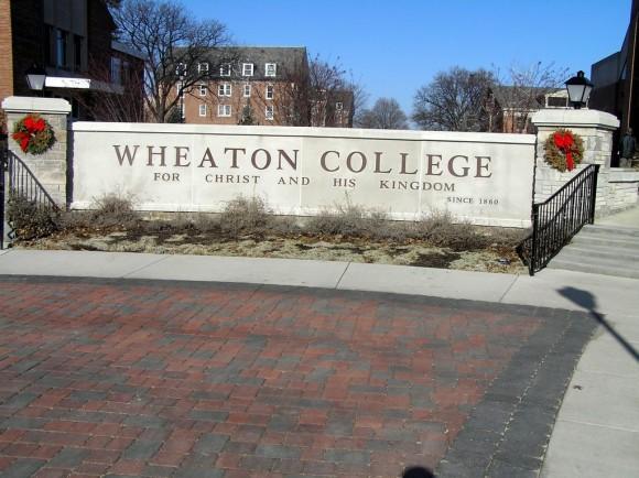 Wheaton College campus sign in Illinois. ("Wheaton College" by Stevan Sheets/Flickr ll <a href="http://ept.ms/2haHp2Y">CC BY 2.0</a>)