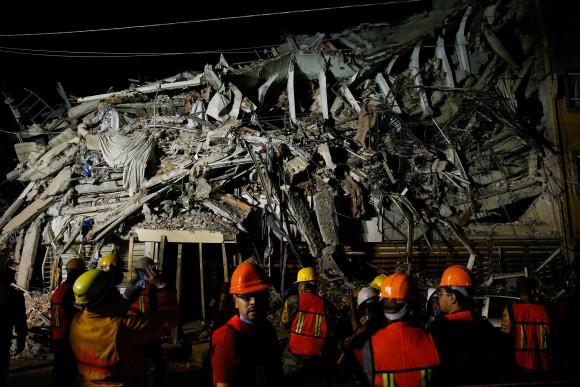 Rescuers work at the site of a collapsed building Sept. 20, 2017, after an earthquake shook Mexico City the day before. (Henry Romero/Reuters)