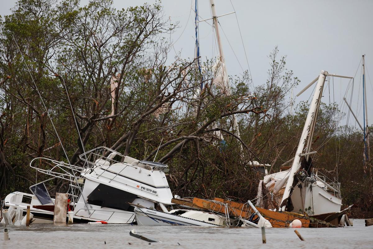  Damaged boats are seen after the area was hit by Hurricane Maria in Salinas, Puerto Rico on Sept. 21, 2017. (REUTERS/Carlos Garcia Rawlins)