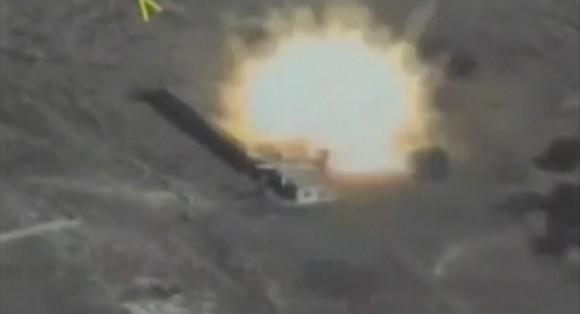 A still image taken from video footage and released by Russia's Defense Ministry on Sept. 22, 2017, shows a missile hitting a building, which the Defense Ministry said was a Jabhat al-Nusra target in Syria. (Russian Defense Ministry/Handout via Reuters TV)