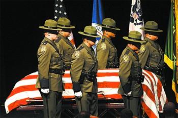 Memorial service for Border Patrol agent Robert Rosas, who was killed in the line of duty, in El Centro, Calif., on July 31, 2009.(DAVID MCNEW/GETTY IMAGES)