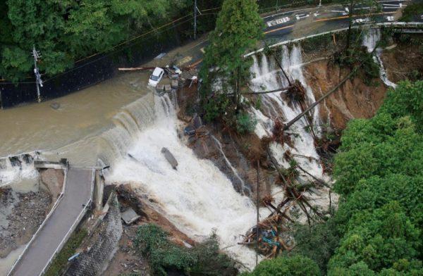 A collapsed road is seen following torrential rain caused by typhoon Lan in Kishiwada, Japan on Oct. 23, 2017. (Kyodo/via Reuters)