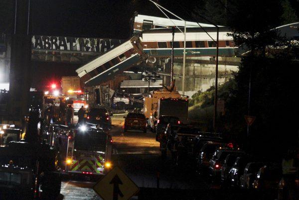 The scene where an Amtrak passenger train derailed on a bridge over interstate highway I-5 in DuPont, Washington, U.S. December 18, 2017. (REUTERS/Steve Dipaola)