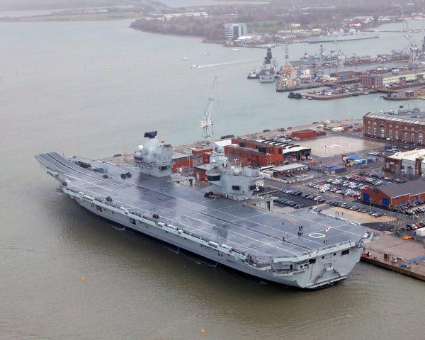 The Royal Navy's aircraft carrier HMS Queen Elizabeth is docked the day it was commissioned by Britain's Queen Elizabeth in Portsmouth, December 7, 2017. (Si Ethell/Royal Navy handout via Reuters)