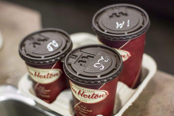 Cups of coffee sit on a counter in a Tim Hortons in Oakville, Ontario. (The Canadian Press/Chris Young)