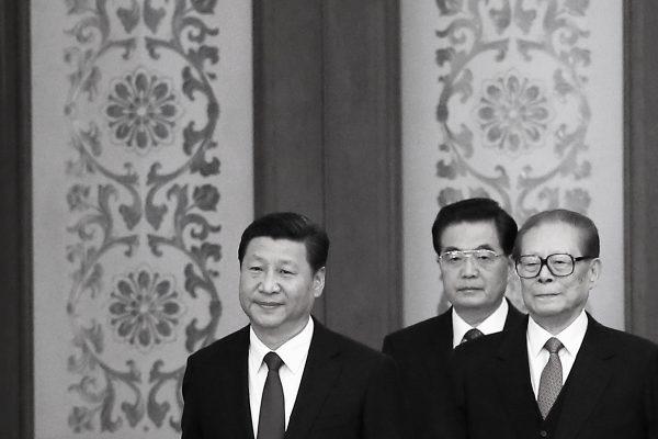 Chinese President Xi Jinping (L) and his predecessors Hu Jintao (C) and Jiang Zemin arrive for the National Day reception marking the 65th anniversary of the founding of the People's Republic of China at The Great Hall Of The People on September 30, 2014 in Beijing, China. (Feng Li/Getty Images)
