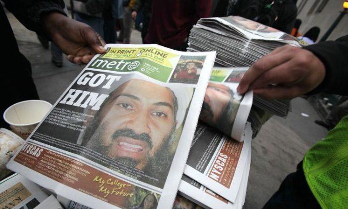 Copies of a newspaper are seen outside the World Trade Center site after the death of accused 9/11 mastermind Osama bin Laden was announced by U.S. President Barack Obama, in New York City, on May 2, 2011. (Mario Tama/Getty Images)