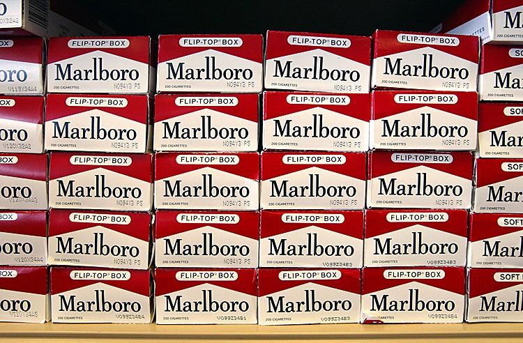Cartons of Marlboro brand cigarettes are seen inside a Cigarettes Cheaper store on June 13, 2003, in Niles, Illinois. (Tim Boyle/Getty Images)
