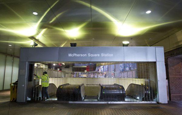 Metro employee shuts down escalators to the McPherson Square Station in Washington, D.C., on March 16, 2016. (AP Photo/Pablo Martinez Monsivais)