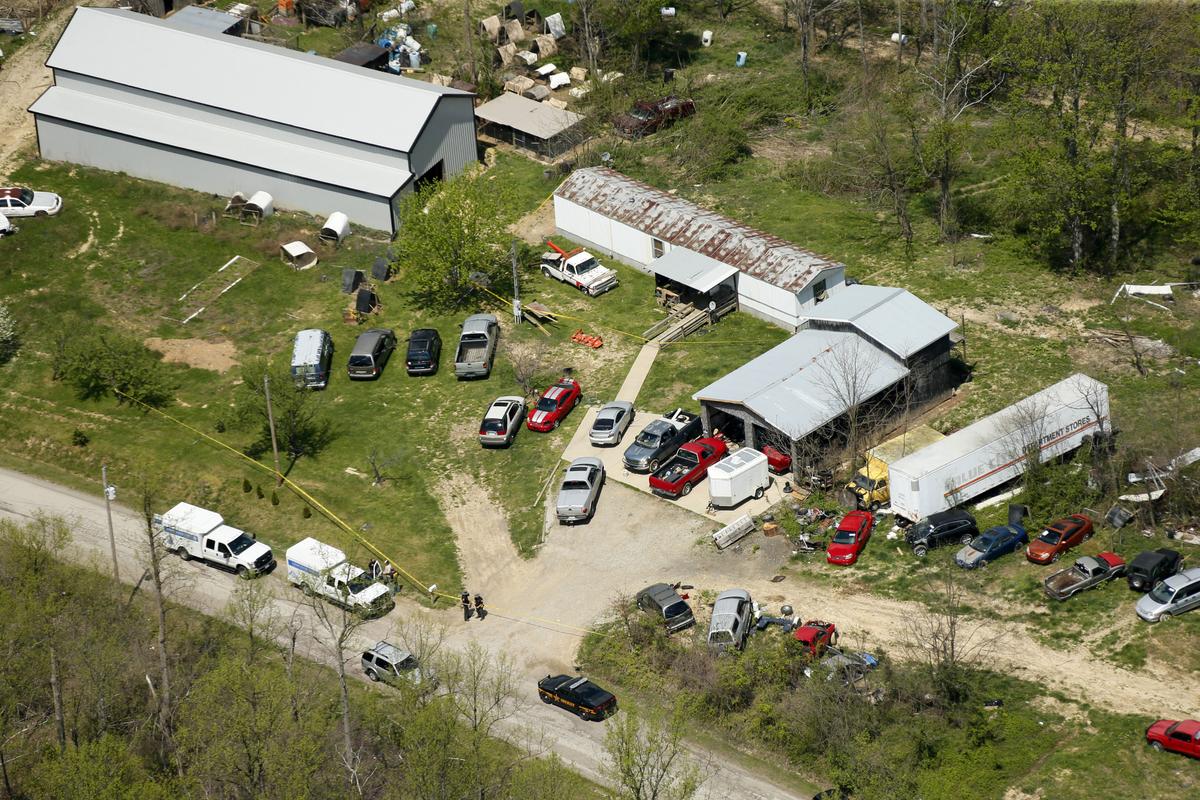 This aerial photo shows one of the locations being investigated in Pike County, Ohio, following the slayings of eight members of the Rhoden family Friday, April 22, 2016. (Lisa Marie Miller/The Columbus Dispatch via AP)