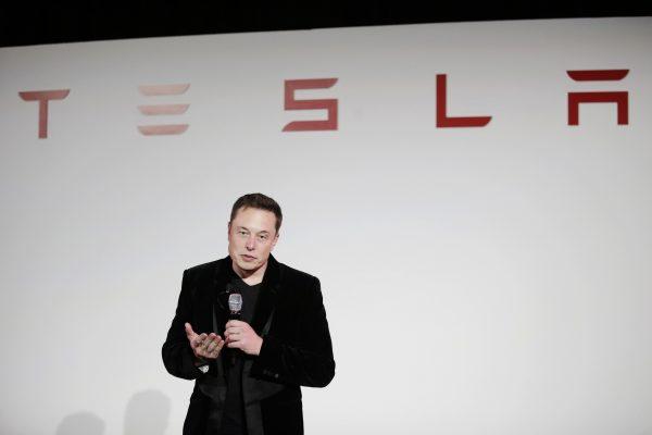 Elon Musk, CEO of Tesla Motors Inc., talks about the Model X car at the company's headquarters, in Fremont, CA., in this file photo. (AP Photo/Marcio Jose Sanchez, File)