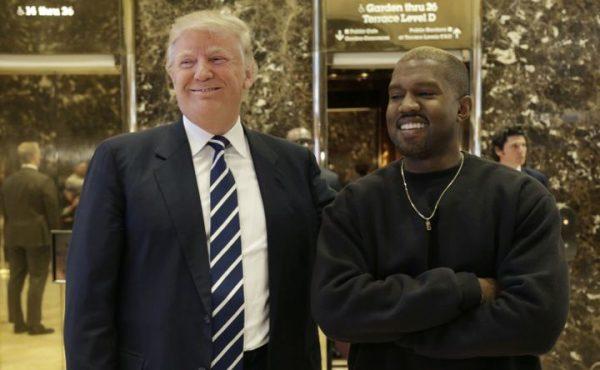 President-elect Donald Trump and Kanye West pose for a picture in the lobby of Trump Tower in New York on Dec. 13, 2016. (Seth Wenig/AP Photo)