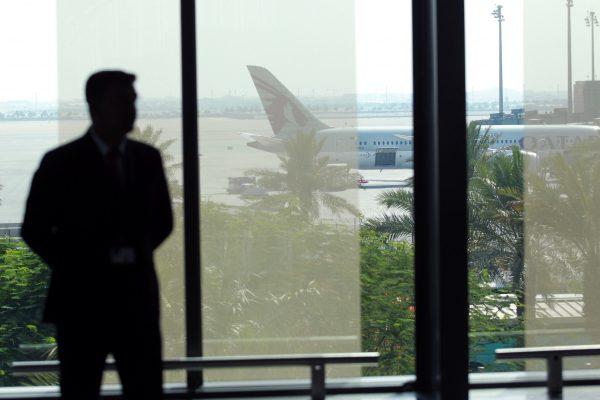 A staff member stands at Hamad International Airport in Doha, Qatar on June 7, 2017. (Reuters/Naseem Zeitoon)