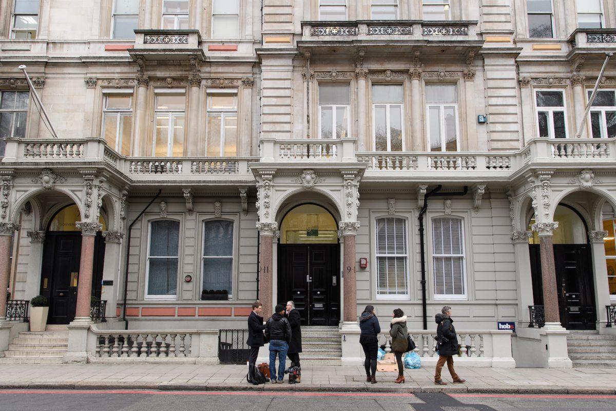Journalists gather outside the headquarters of Orbis Business Intelligence, the company run by former intelligence officer Christopher Steele, in London on January 12, 2017. (Leon Neal/Getty Images)