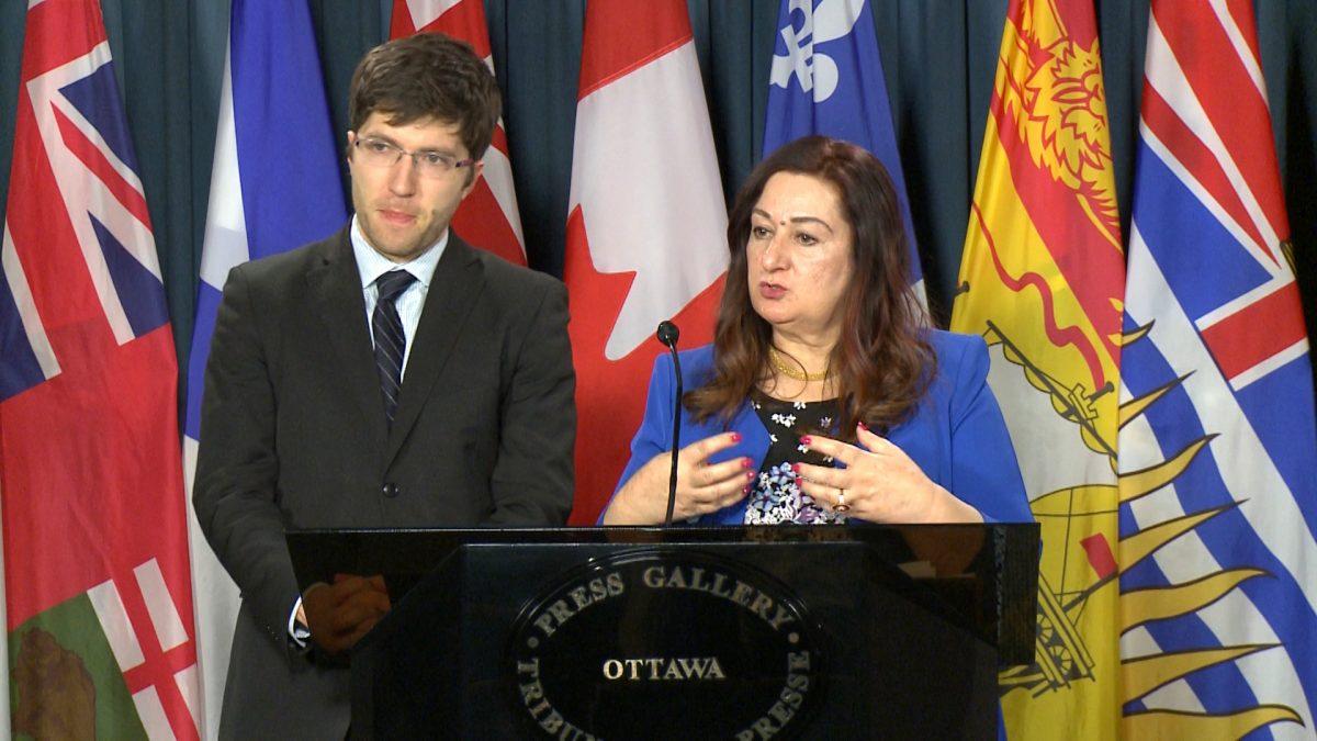 Sen. Salma Ataullahjan speaks about her new organ trafficking bill while MP Garnett Genuis looks on at a Parliament Hill press conference on Dec. 12, 2017, in Ottawa. (Limin Zhou/The Epoch Times)