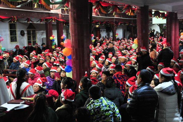 China’s Christian population has soared in recent years and is now numbered in the tens of millions. This photo taken on December 24, 2017 shows Chinese Christians attending a Christmas Eve mass at a church in Fuyang in China's eastern Anhui province. (AFP/Getty Images)