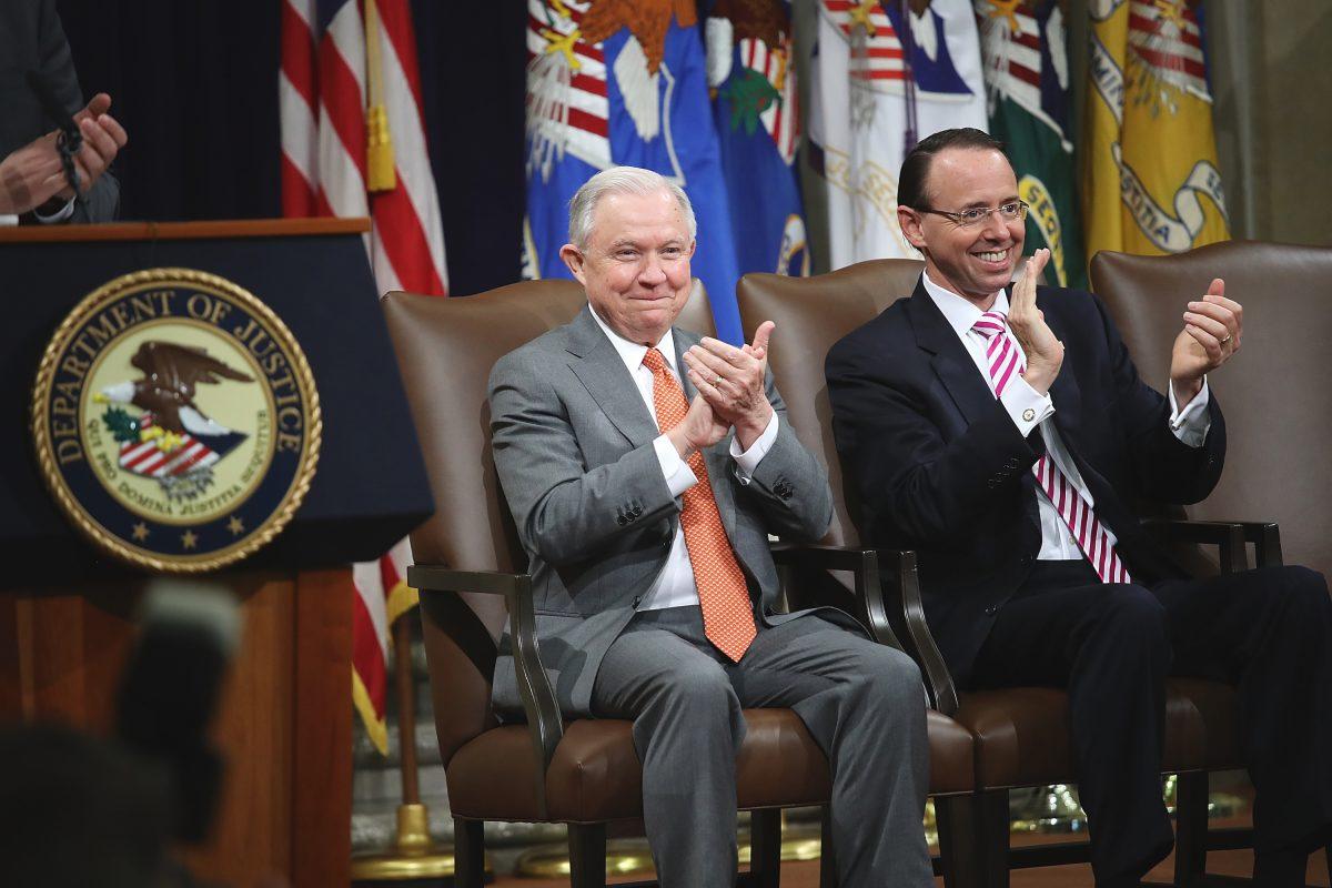 U.S. Attorney General Jeff Sessions (L) and Deputy Attorney General Rod Rosenstein (R) attend the Religious Liberty Summit at the Department of Justice on July 30, 2018. Win McNamee/Getty Images